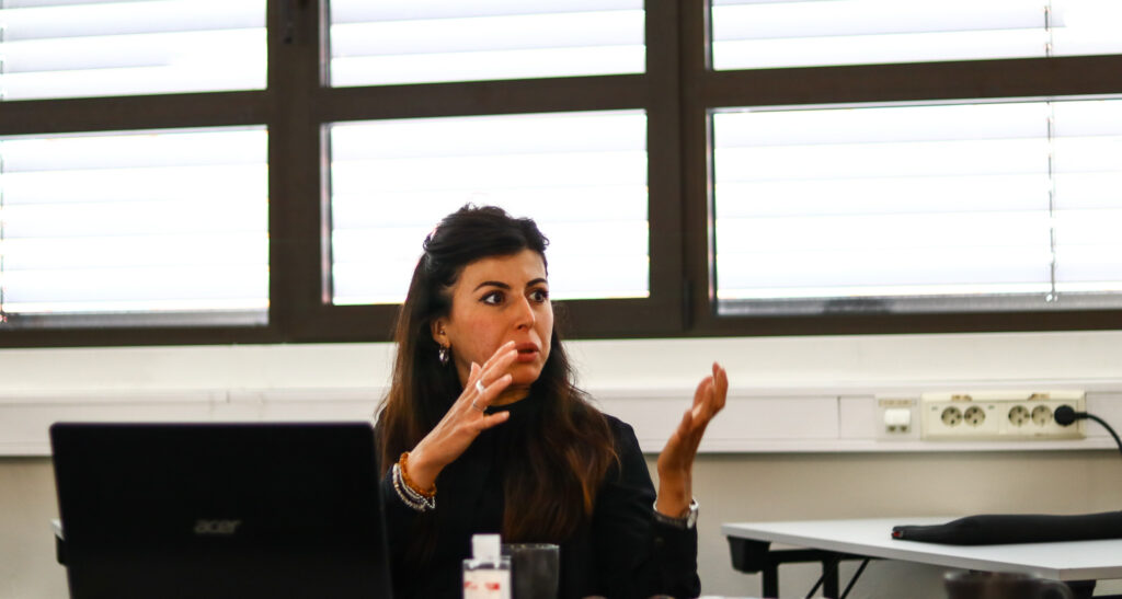 Photo of a woman at PIA meeting