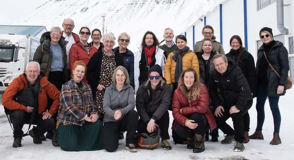 A group of people visiting Iceland in the winter